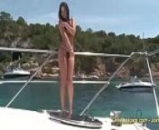 Mili Jay Sunbathes In The Nude from nude on a boat