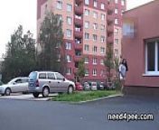 Half naked brunette pissing behind a building from got2pee peachy boom