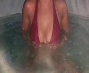 Hot young lady in hot tub from saw tub