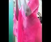 Swathi naidu in pink saree getting ready from meghna naidu rain saree wet song
