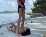 Girls piss on each other on a snow-white beach and play with splashes from urine nude