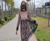 Lustful girl in a transparent dress in a public park from moeimg